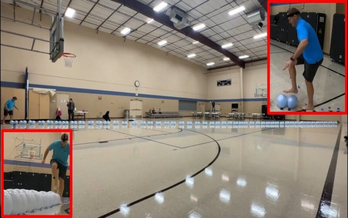 Homem pisa 100 balões em 22,38 segundos para conquistar recorde mundial