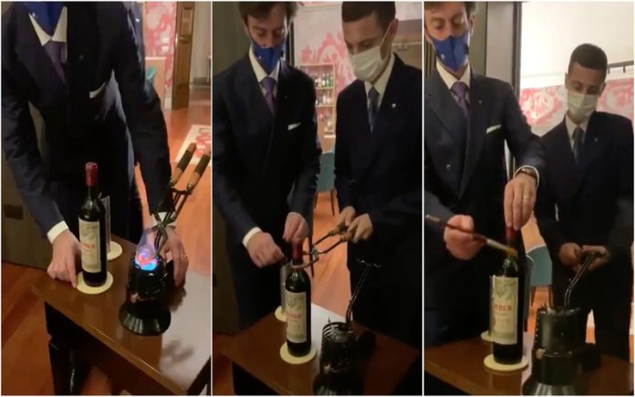 O truque para abrir uma garrafa de vinho Petrus de 1961 que custa 11 mil euros