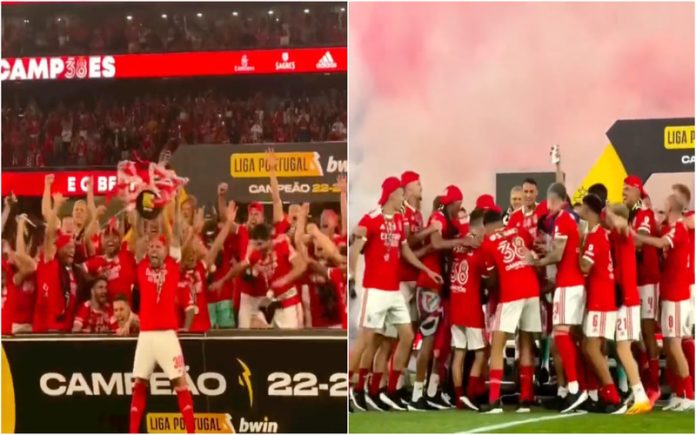 Otamendi quase parte um pé no momento de levantar a taça de campeão do Benfica