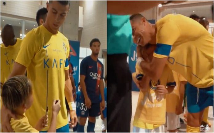 Ronaldo emociona criança e tem reação viral tocante