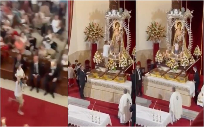Emocionante ato: Homem corre com criança aos ombros e a coloca junto à Virgem Maria no altar