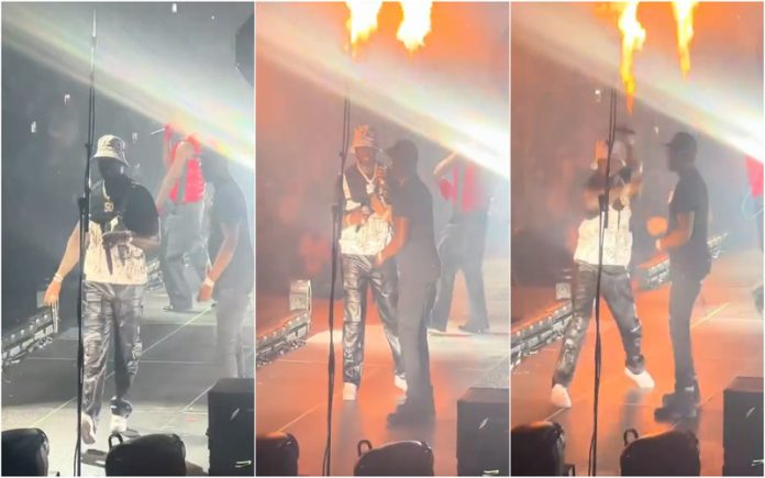 50 Cent fica atira microfone e acerta na cabeça de uma mulher
