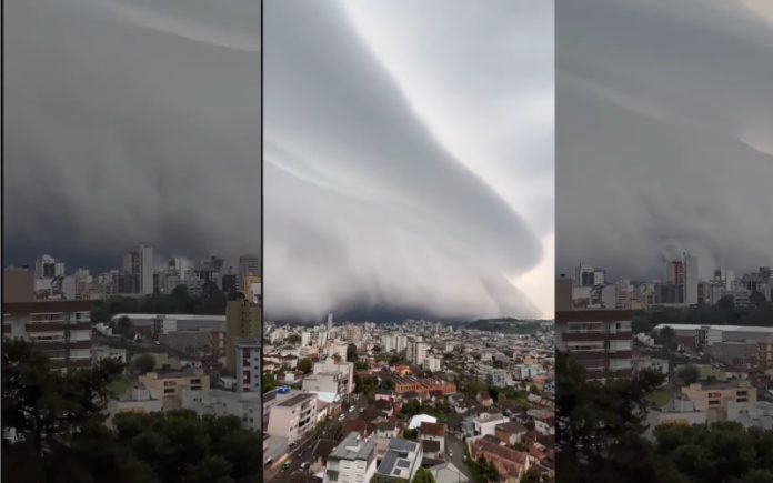 Nuvem engole cidade e noite vira dia