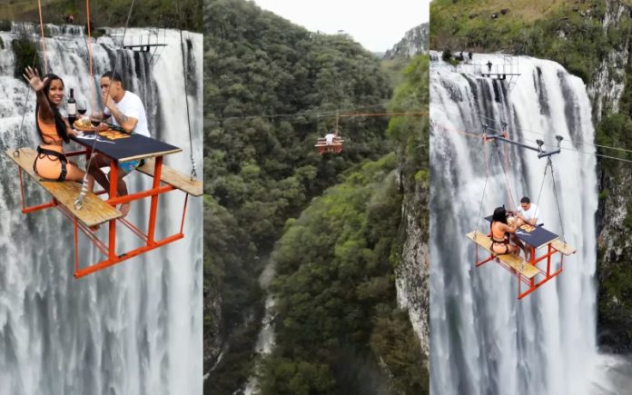 Casal destemido decide jantar a uma altura de 90 metros sobre uma cascata