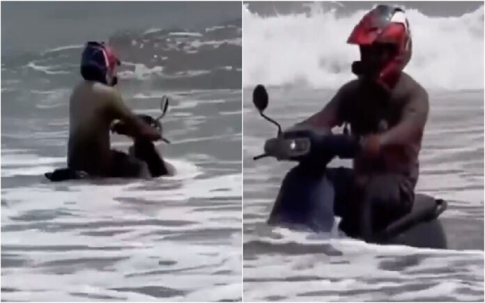 Homem entra no mar de scooter como fosse algo normal