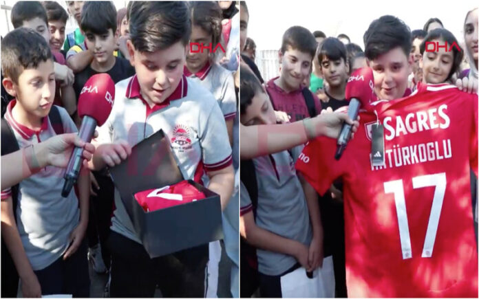 Menino emocionado com saída de Aktürkoglu recebe camisola do Benfica