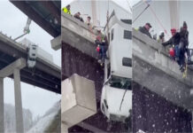 Camião fica suspenso em ponte durante nevão e motorista é salvo por equipas de resgate