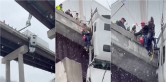 Camião fica suspenso em ponte durante nevão e motorista é salvo por equipas de resgate